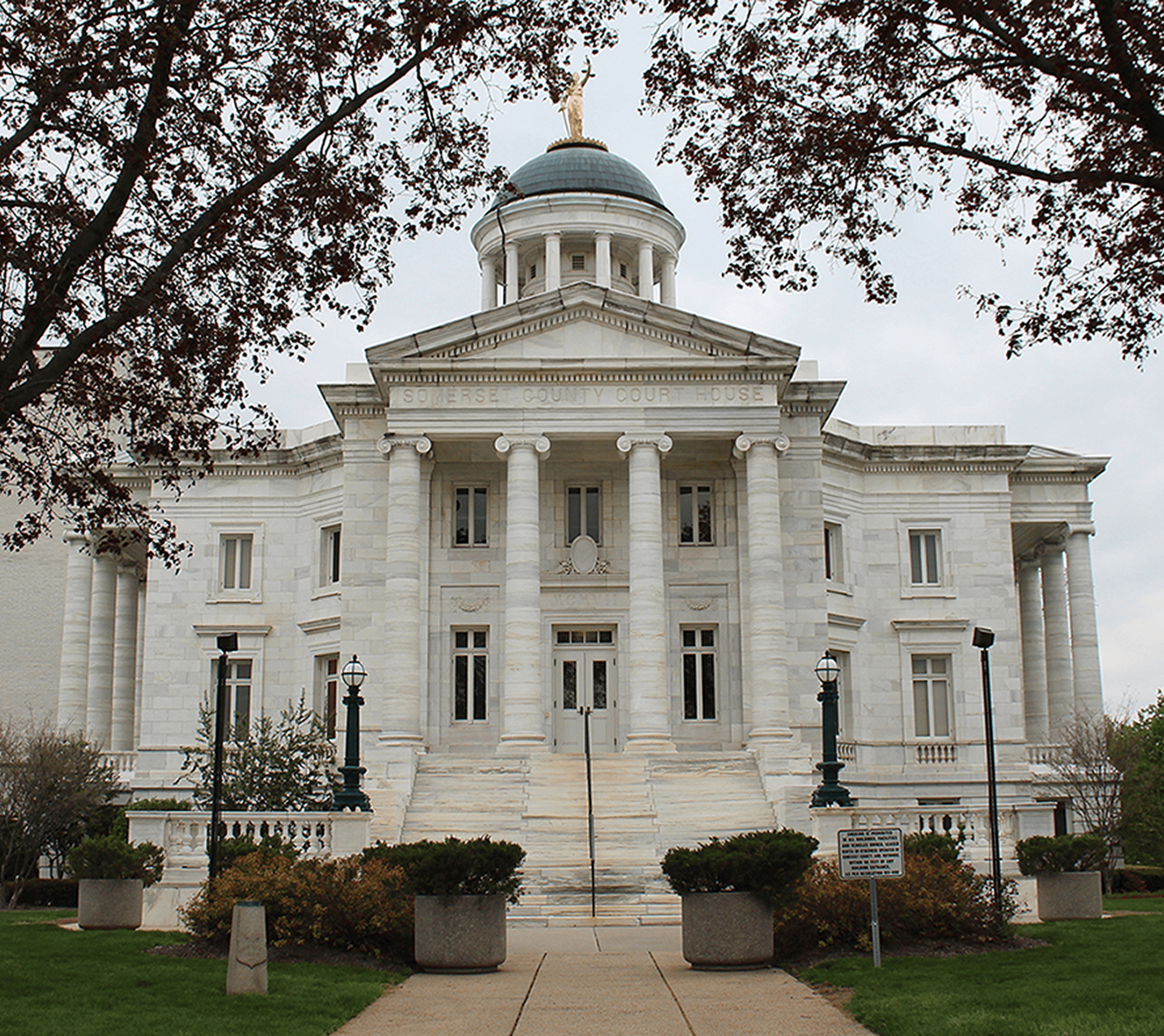 White stone courthouse and garden view